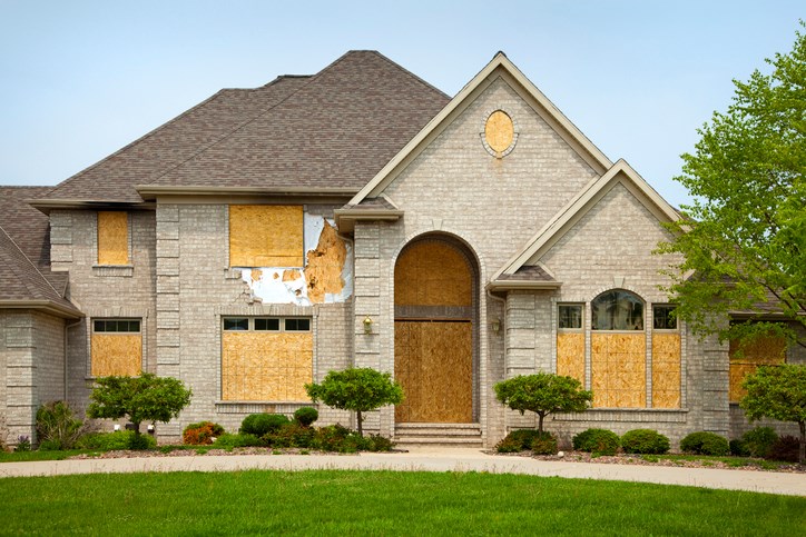 What to consider before you file a claim after a storm damages your house