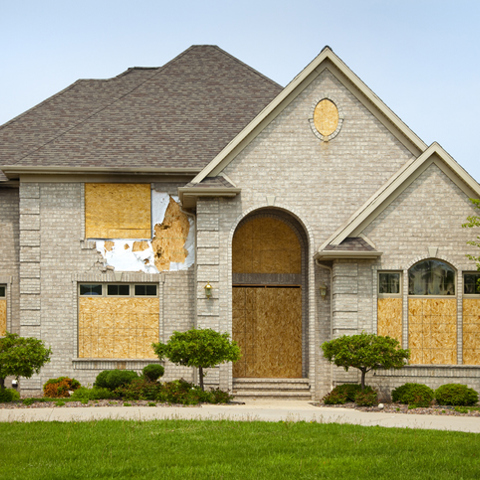What to consider before you file a claim after a storm damages your house