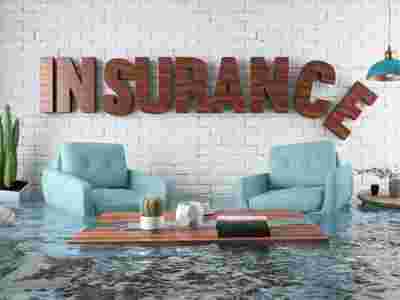 Licensed public adjuster reviewing property damage with a homeowner