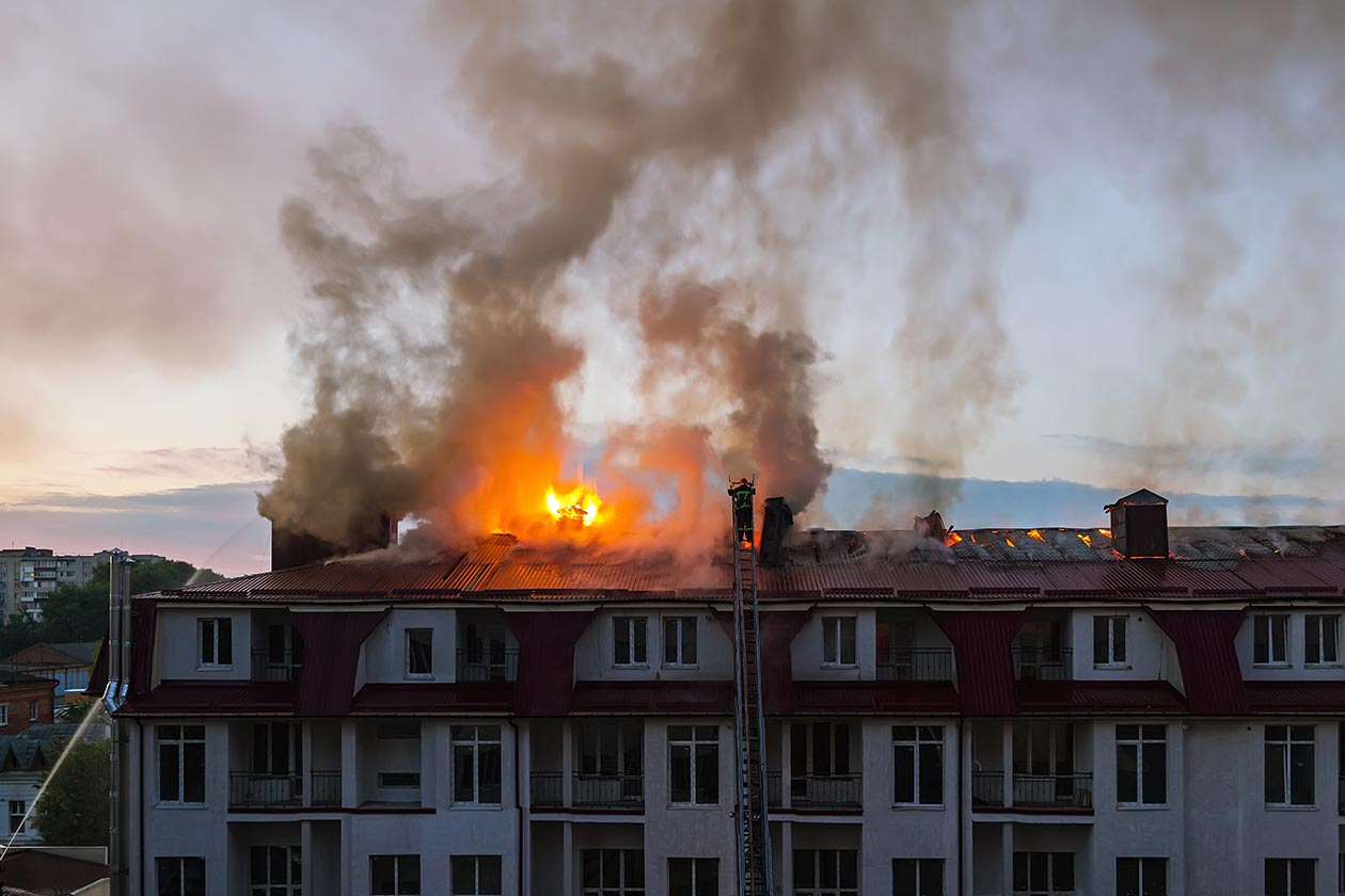 residential apartment roof on fire